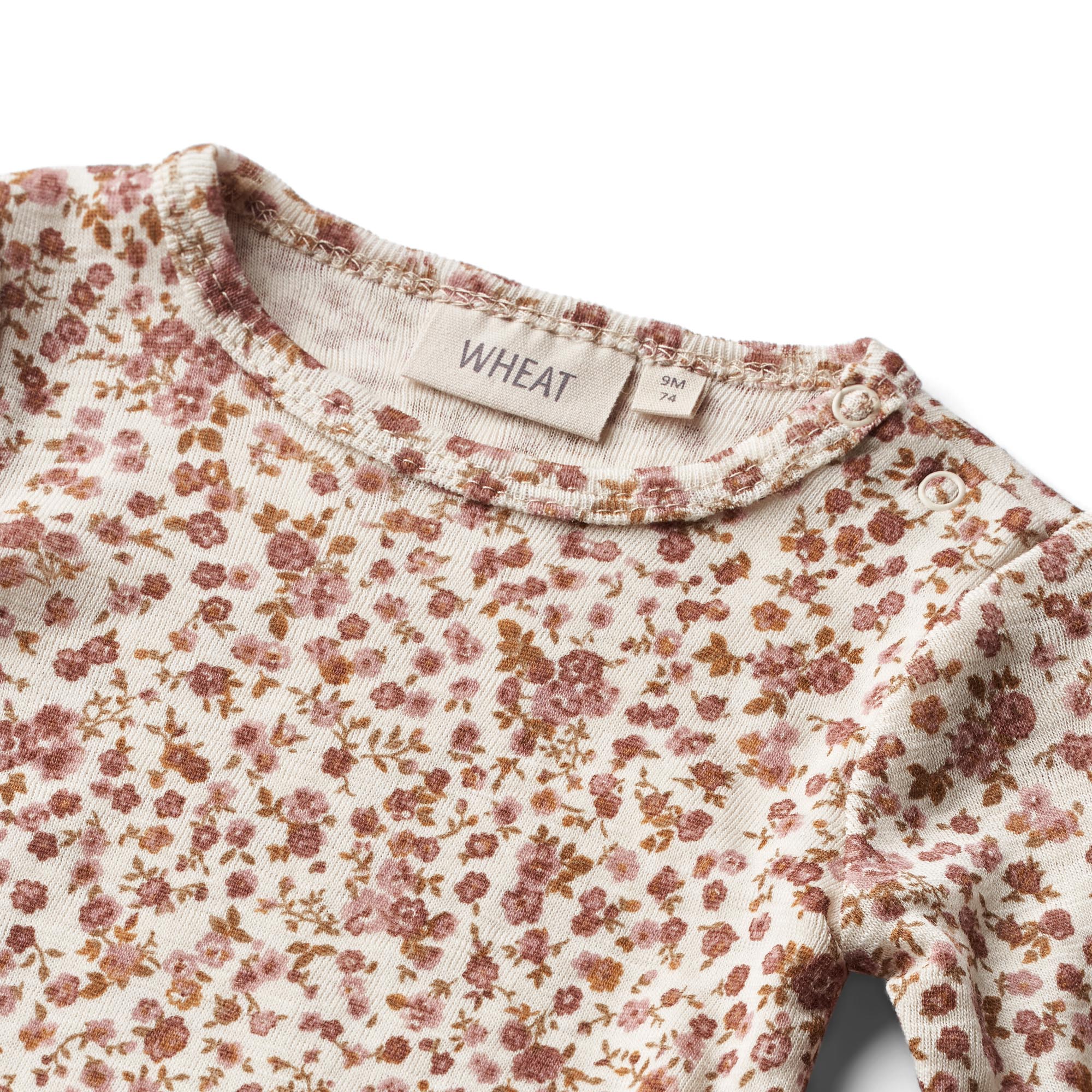 Wollen romper Lucca- Rozenbloemen